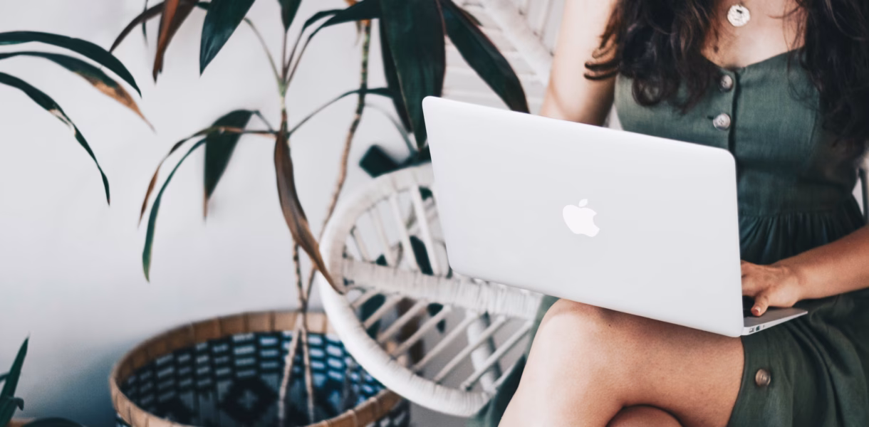 a girl that works on a computer as a digital nomad