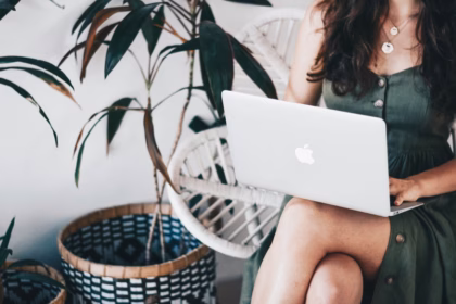 a girl that works on a computer as a digital nomad