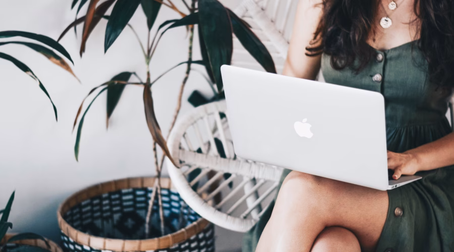 a girl that works on a computer as a digital nomad