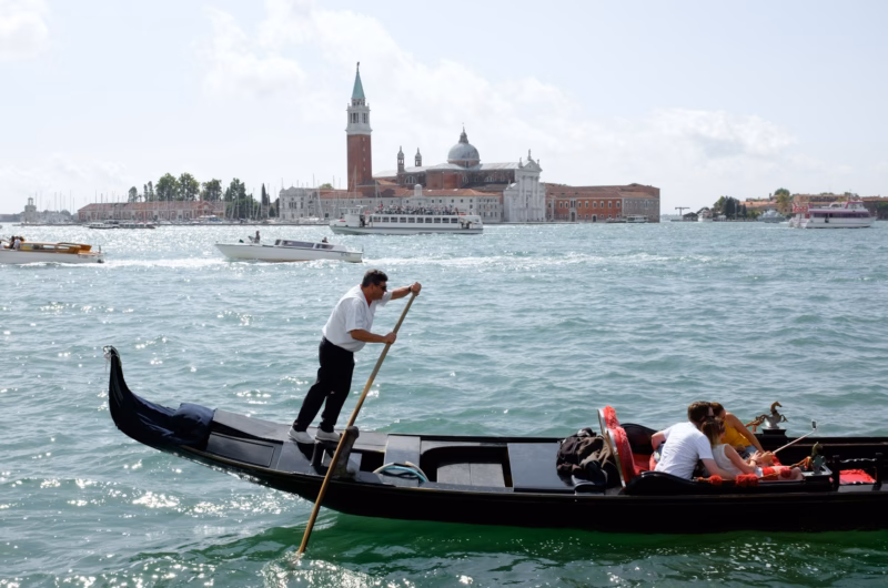 tourists on gondola in venice