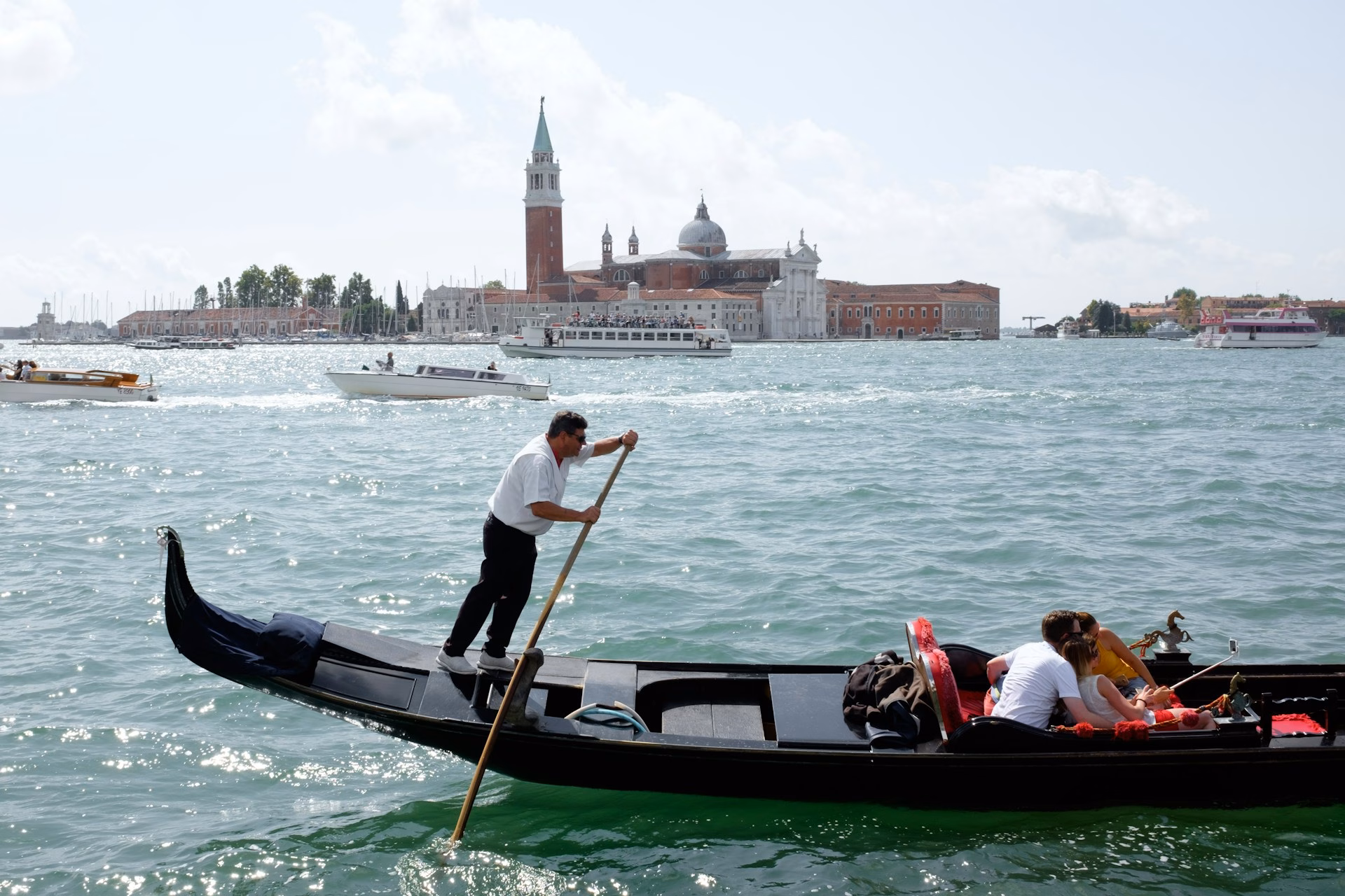 tourists on gondola in venice