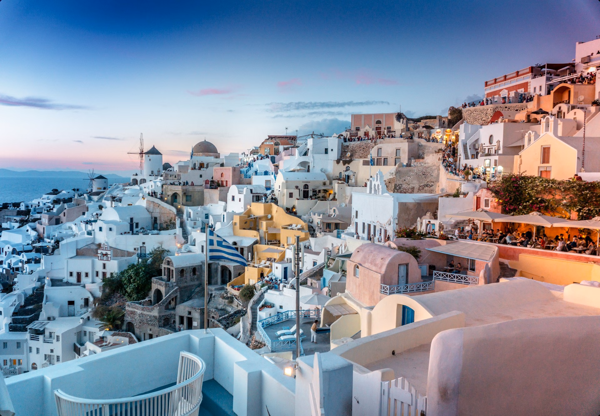 Best places to travel in June 2025 - sunset over Santorini, Greece