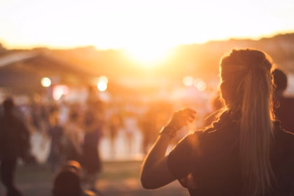 Woman standing in a festival: roskilde festival