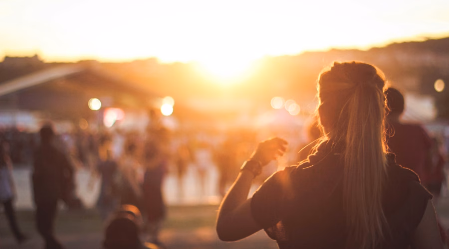 Woman standing in a festival: roskilde festival