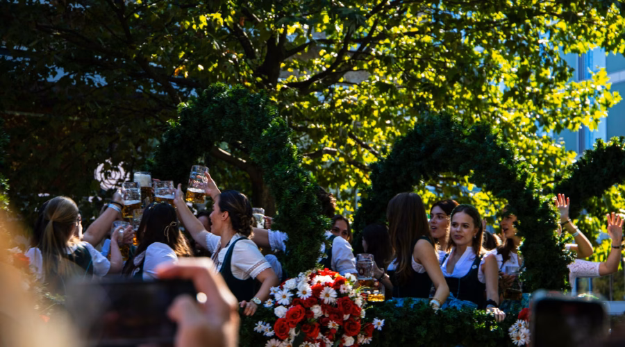 people celebrating at munich oktoberfest: what to expect for 2025