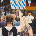 oktoberfest 2025: people celebrating with beer