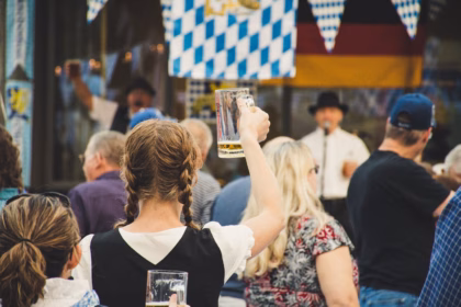 oktoberfest 2025: people celebrating with beer