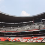 people watching football game during daytime
