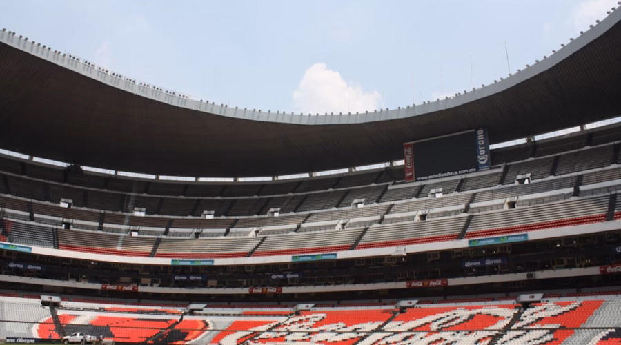 people watching football game during daytime
