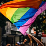 people holding flags during daytime