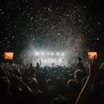 people gathering on concert field