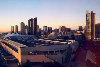 a view of a city with tall buildings