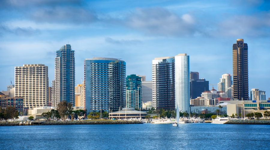 City skyline with boats on the water.
