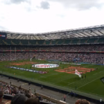 Packed rugby stadium crowd during an international match