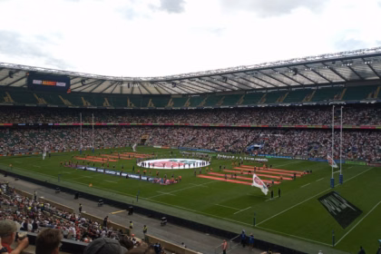 Packed rugby stadium crowd during an international match