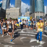Runners gathered for the Chicago Marathon 2026 with the city skyline behind