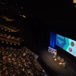 Panel discussion on stage at Web Summit 2026