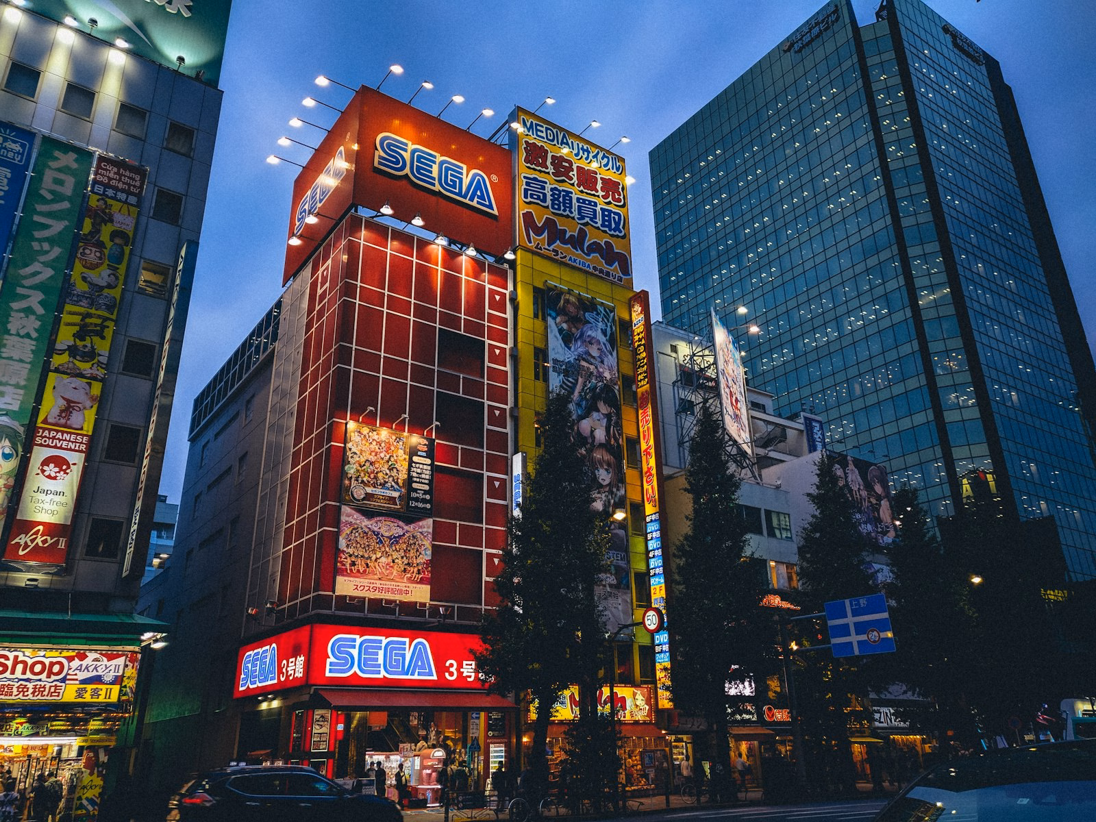 Akihabara lit up at night, a stop for many Comiket visitors