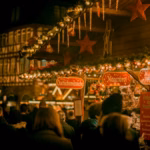 Dortmund Christmas Market 2026: visitors at illuminated market stalls at night