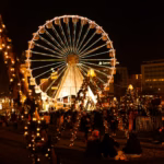 Ferris wheel surrounded by Christmas lights in Lisbon