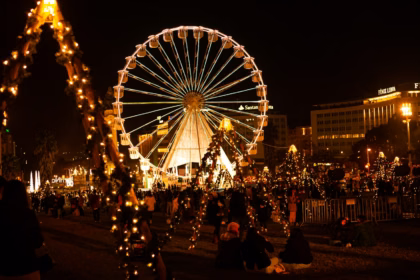 Ferris wheel surrounded by Christmas lights in Lisbon