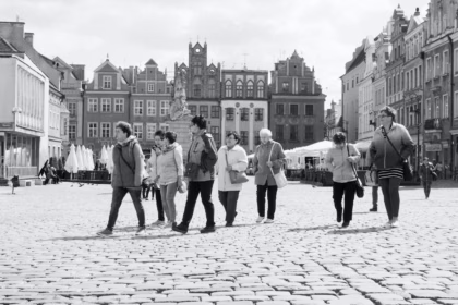 St. Martin's Day in Poznań: people walking across a city square in Poznań