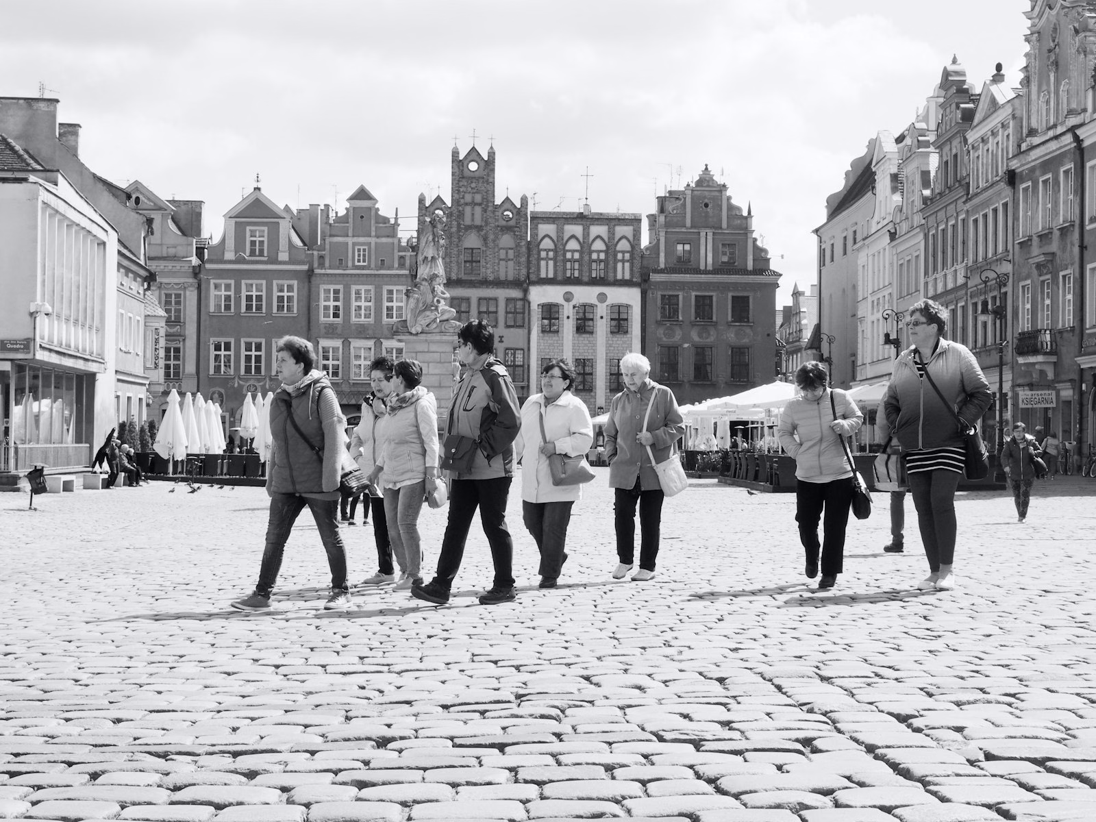 St. Martin's Day in Poznań: people walking across a city square in Poznań