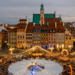 Warsaw Old Town buildings lit up with Christmas lights