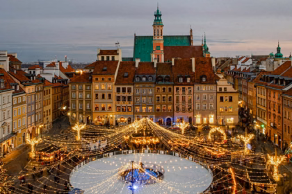 Warsaw Old Town buildings lit up with Christmas lights