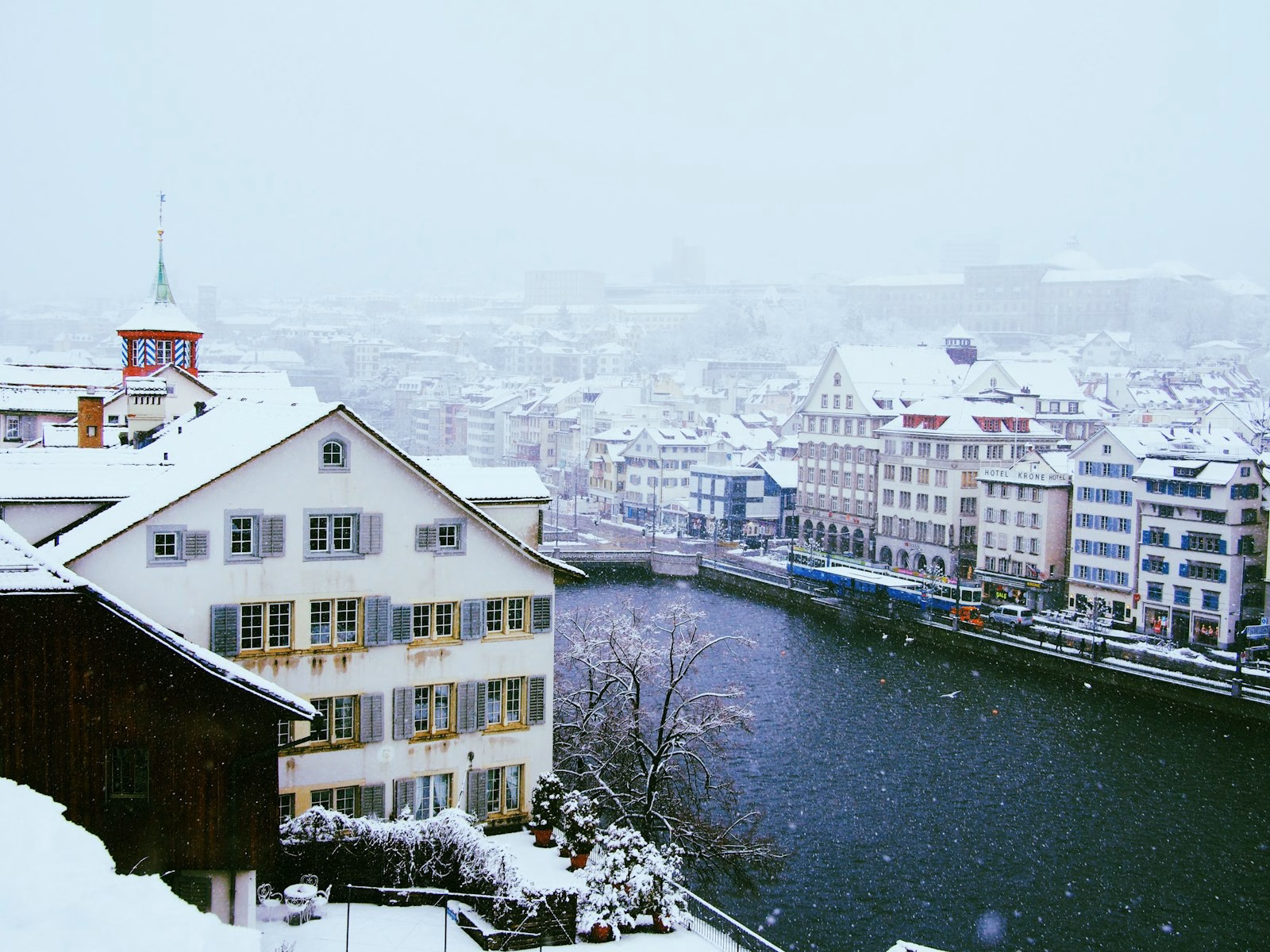 Snowy Limmat river and old town in winter, close to the Zurich Christmas market